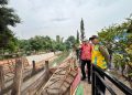 Anggota DPR RI Dapil Jambi, Edi Purwanto Saat Turun Lapangan Tinjau Proyek Kolam Retensi. FOTO: IST