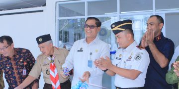 Kanwil Ditjenpas Jambi Irwan Rahmat Gumilar bersama Stafsus Kemenimipas, Abdullah Rasyid saat meresmikan koperasi Siginjai. FOTO: IST