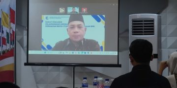 Kanwil HAM Jambi saat menjadi narasumber via zoom pada kegiatan FGD yang digelar oleh Pusakademia. FOTO: OYI