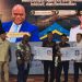 Menteri HAM RI saat menyerahkan KTP El kepada perwakilan SAD yang didampingi oleh Kanwil HAM Jambi, Sukiman. FOTO: IST